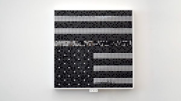 Don't Go Quiet — flip-disc kinetic wall art