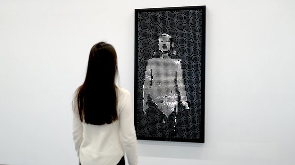 Portraits in Black and Silver — interactive flip-disc mirror artwork